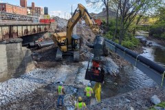 April 2020 - Workers remove the temporary pumps that were used during demolition of the northbound bridge. The contractor will use an alternate stream diversion system utilizing 36-inch pipes to divert the Stony Creek while the new bridges are built.