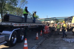 May 2020 - Crews unload caissons that will be used to support the new bridge over Stony Creek.