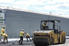 May 2021 - A paving crew places asphalt for the rebuilt northbound lanes between Marshall Street and Elm Street.