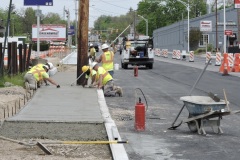 May 2022 - Workers construct a new sidewalk on the southbound side of Markley Street.
